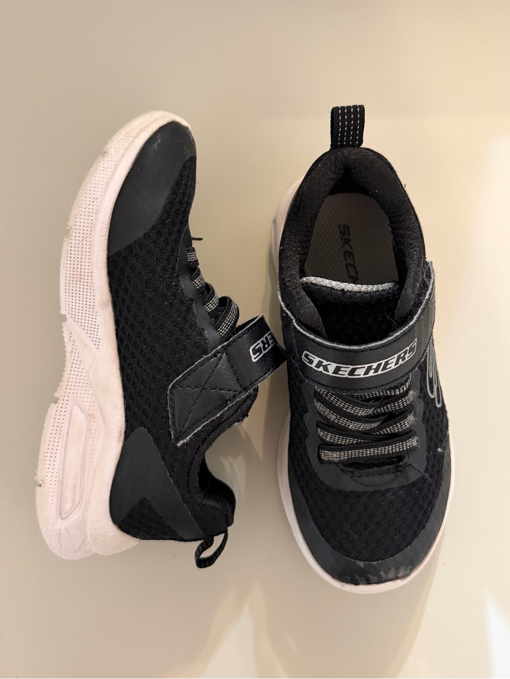 Skechers Kids Black and White Slip-On Athletic Sneakers